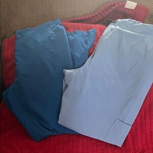 2 pairs Used XL Blue and Light Blue Scrub Pants. Good condition.